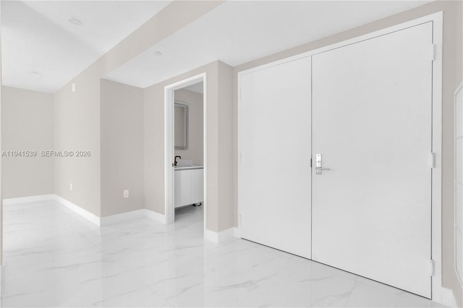 Spacious, unfurnished interior of a new home in Aria Reserve, Miami (Image 23). Spacious, unfurnished interior of a new home in Aria Reserve, Miami (Image 23).