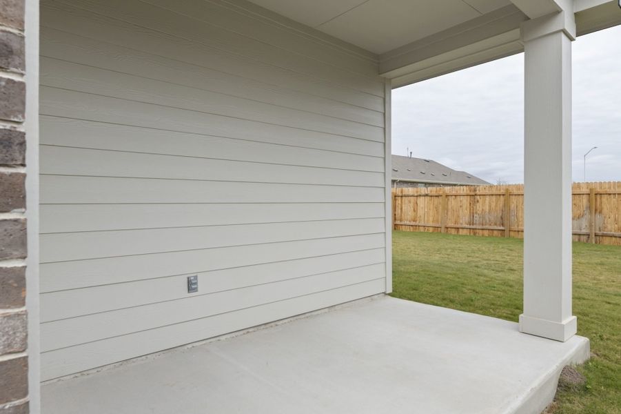 Exterior details and patio area of a home in Village at Three Oaks, Seguin (Image 20). Exterior details and patio area of a home in Village at Three Oaks, Seguin (Image 20).