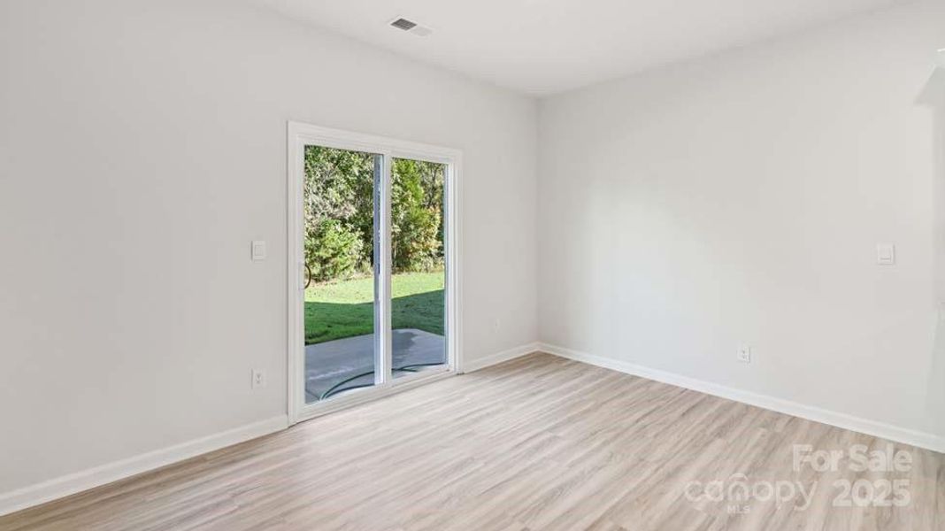 Spacious, unfurnished interior of a new home in Wallace Springs, Statesville (Image 31).