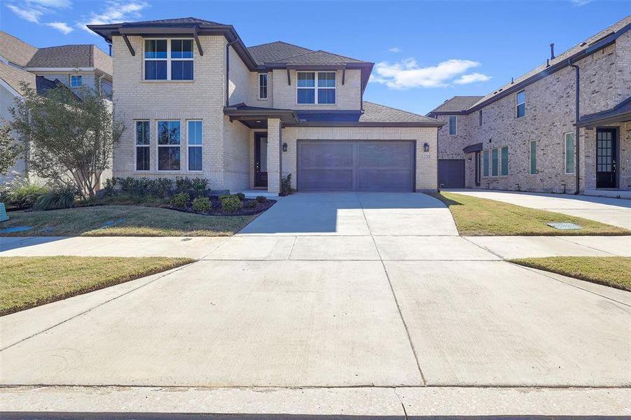 Exterior details and patio area of a home in Garden Collection at Union Park, Little Elm (Image 2).