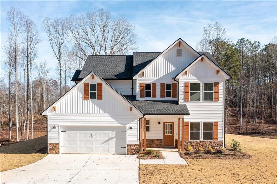 Front exterior of a new home in , Buchanan, GA, highlighting curb appeal (Image 23).