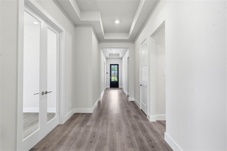 Additional view of the entryway of the home that study with French doors. Additional view of the entryway of the home that study with French doors.