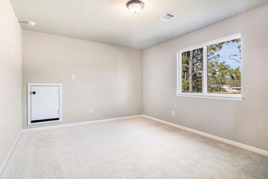 Spacious, unfurnished interior of a new home in Deer Pines, Conroe (Image 26).