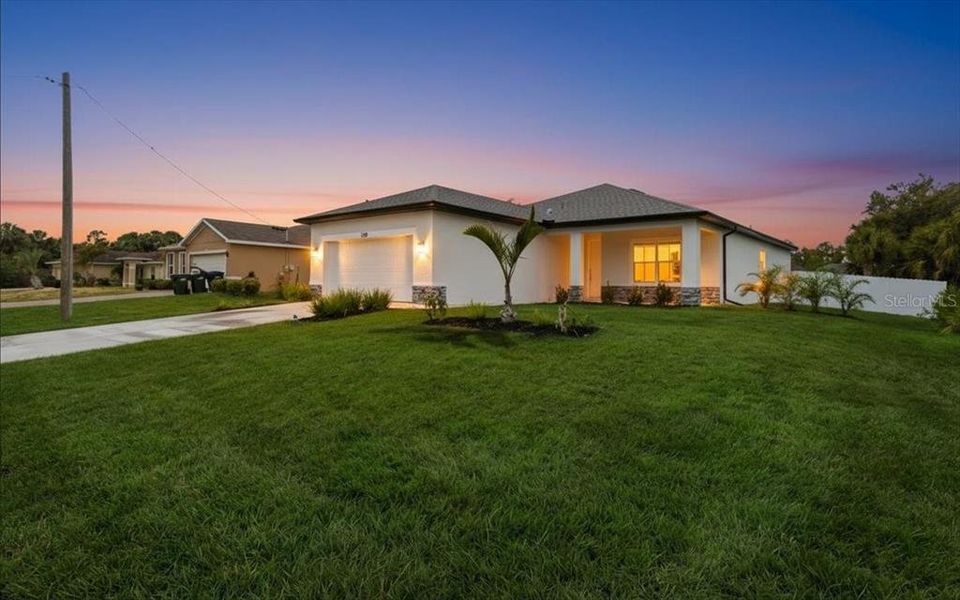 Exterior details and patio area of a home in , North Port (Image 34).