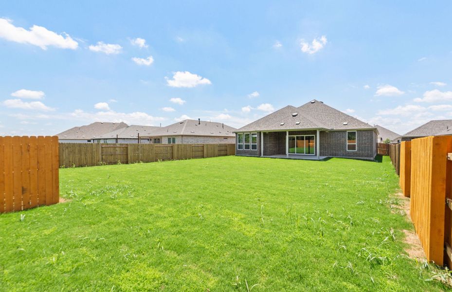 Exterior details and patio area of a home in 6 Creeks, Kyle (Image 24).