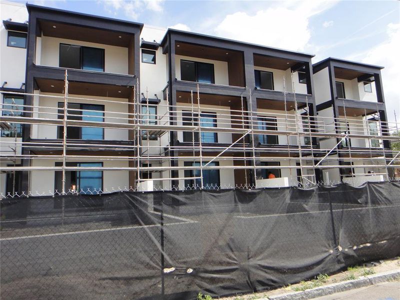 Front exterior of a new home in , Tampa, FL, highlighting curb appeal (Image 2).