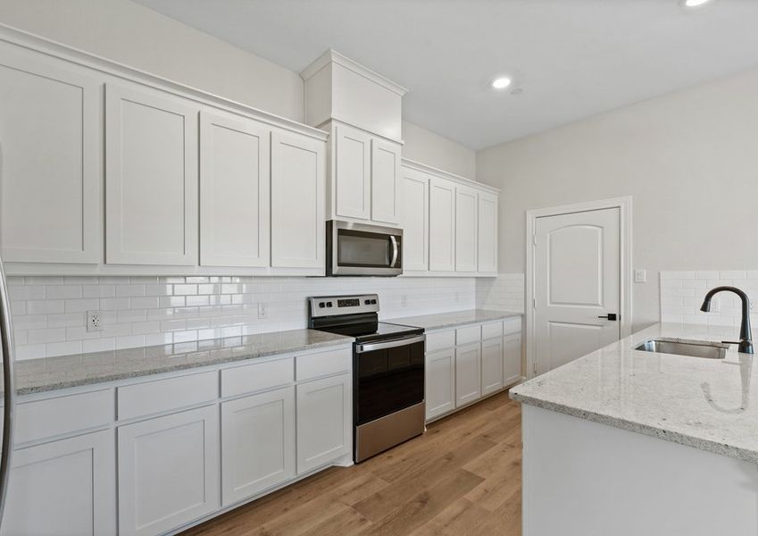 The Caspian has beautiful white kitchen cabinetry.