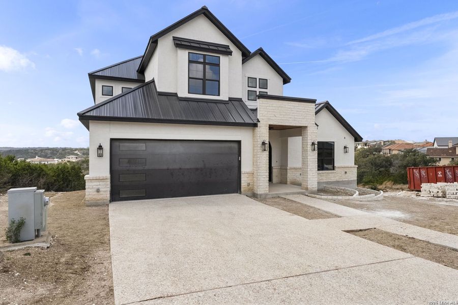 Front exterior of a new home in , Boerne, TX, highlighting curb appeal (Image 26).