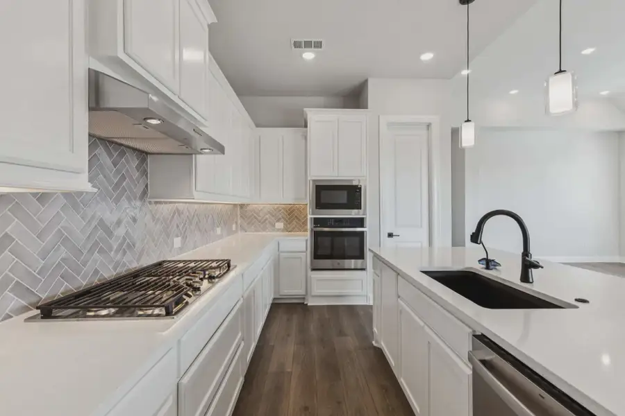 Representative furnished interior of a home built from the Aubrey by Chesmar Homes in Talia, Mesquite (Image 4).