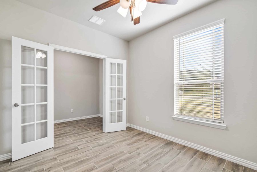 Representative unfurnished interior of a home built from the The Tulip by Lillian Custom Homes in The Preserve, Sherman (Image 22).