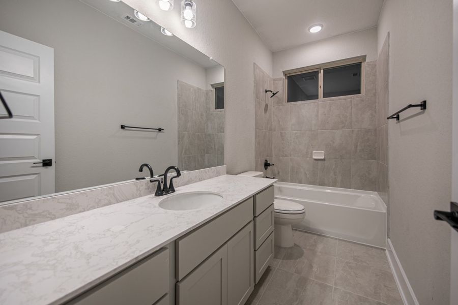 Furnished interior view inside a new home in The Reserve at Potranco Oaks, Castroville (Image 16).