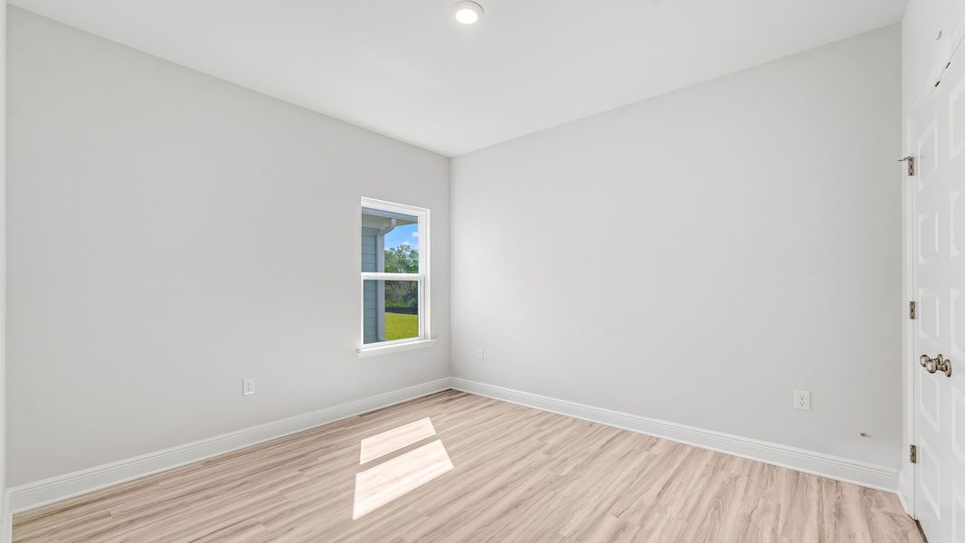 Spacious, unfurnished interior of a new home in WindMark Beach, Port Saint Joe (Image 31).
