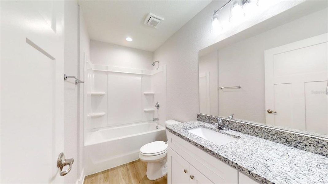 Furnished interior view inside a new home in , Dunnellon (Image 12).