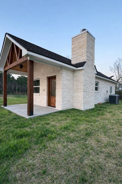Exterior details and patio area of a home in , Groveton (Image 6).