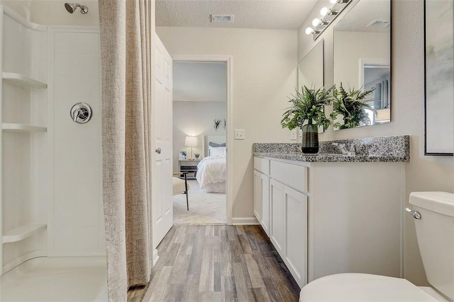 Furnished interior view inside a new home in Eagle Hammock, Eagle Lake (Image 32).