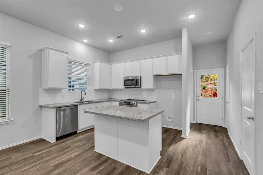 Furnished interior view inside a new home in , Willis (Image 8).
