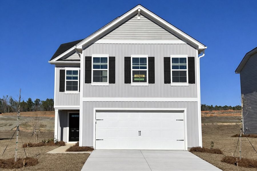 Front exterior of a new home in Canary Woods, Hopkins, SC, highlighting curb appeal (Image 19).