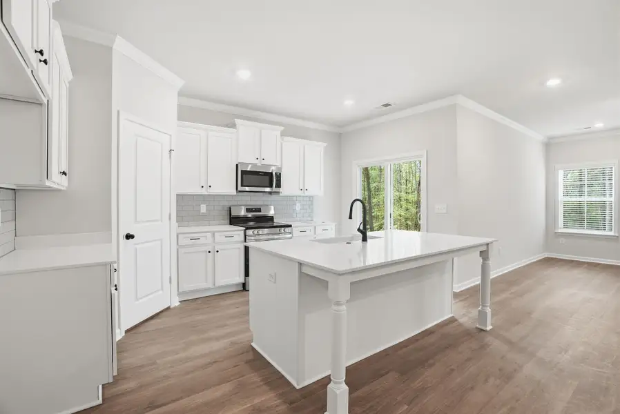 Representative furnished interior of a home built from the Magnolia Select M by McGuinn Homes in Broadway Lake, Anderson (Image 5).