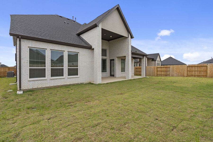Exterior details and patio area of a home in Attwater 55s, Waller (Image 3).