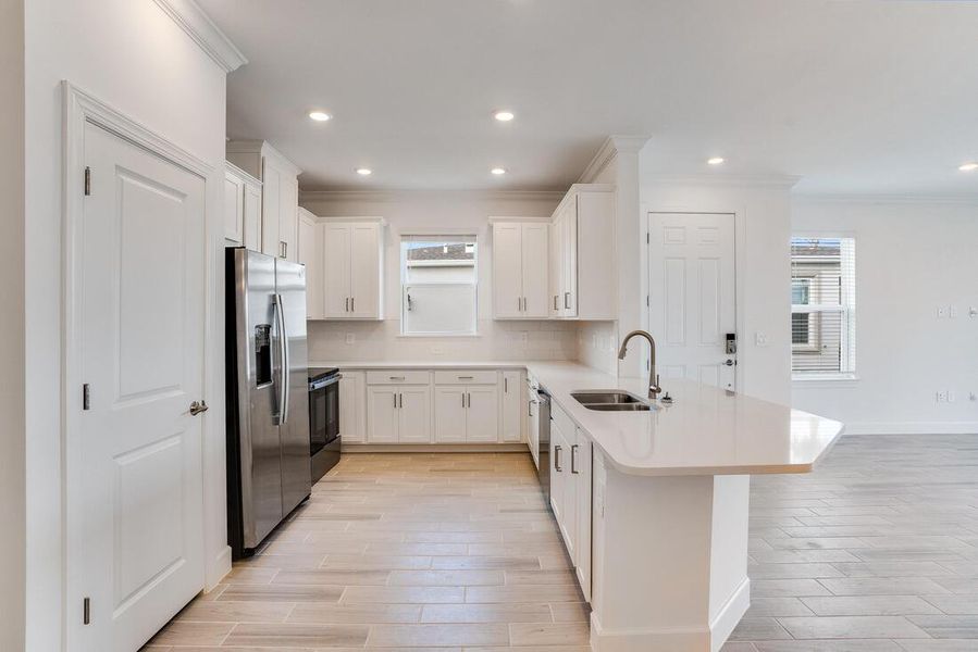 Representative furnished interior of a home built from the Tobago by Taylor Morrison in Esplanade at Kingston, Estero (Image 5). Representative furnished interior of a home built from the Tobago by Taylor Morrison in Esplanade at Kingston, Estero (Image 5).