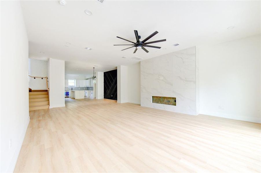 View of the main floor living room. The stair stain color can still be picked by you.