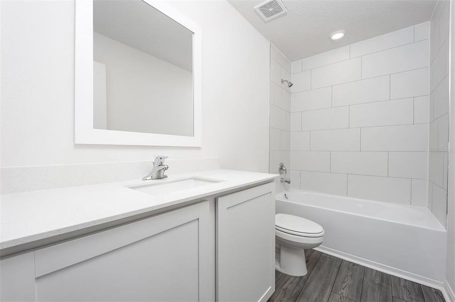 Furnished interior view inside a new home in Tula Parc, Astatula (Image 8).