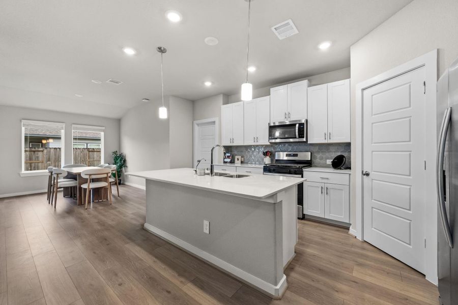 Furnished interior view inside a new home in Heights of Barbers Hill, Mont Belvieu (Image 12).