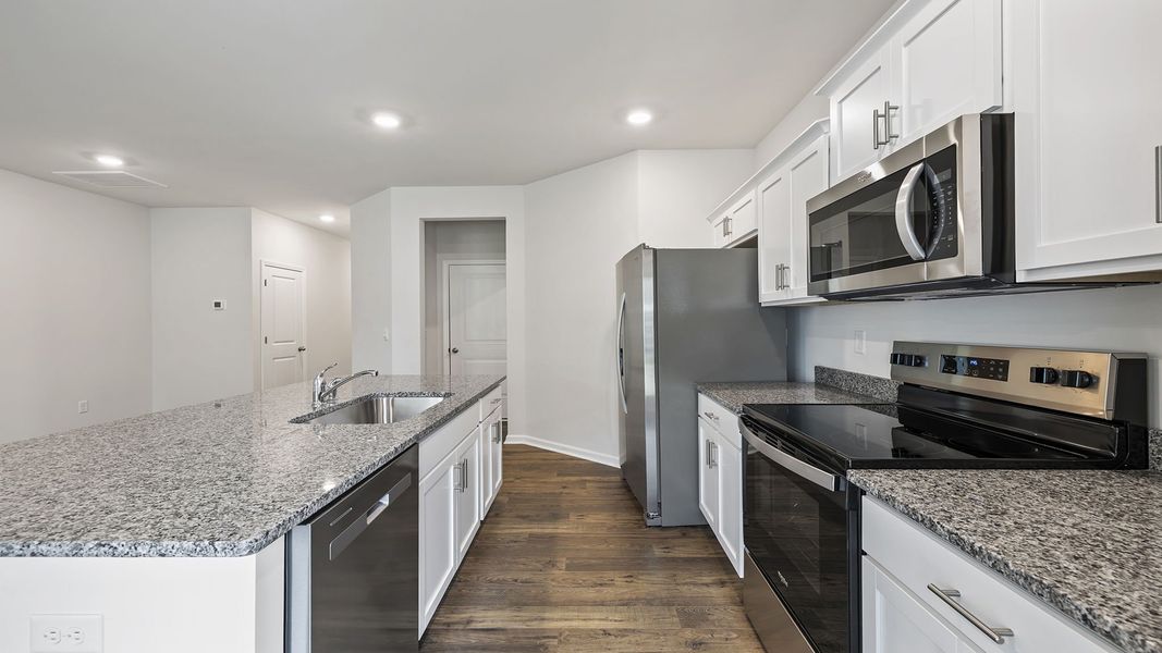 Furnished interior view inside a new home in Tanglewood Townes, Greenville (Image 8).
