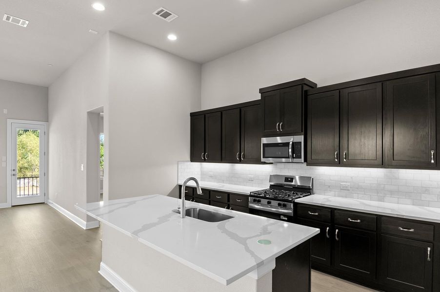 Furnished interior view inside a new home in Cross Creek, Cedar Park (Image 10).