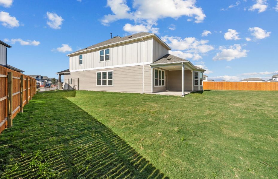 Exterior details and patio area of a home in Santa Rita Ranch, Liberty Hill (Image 4).