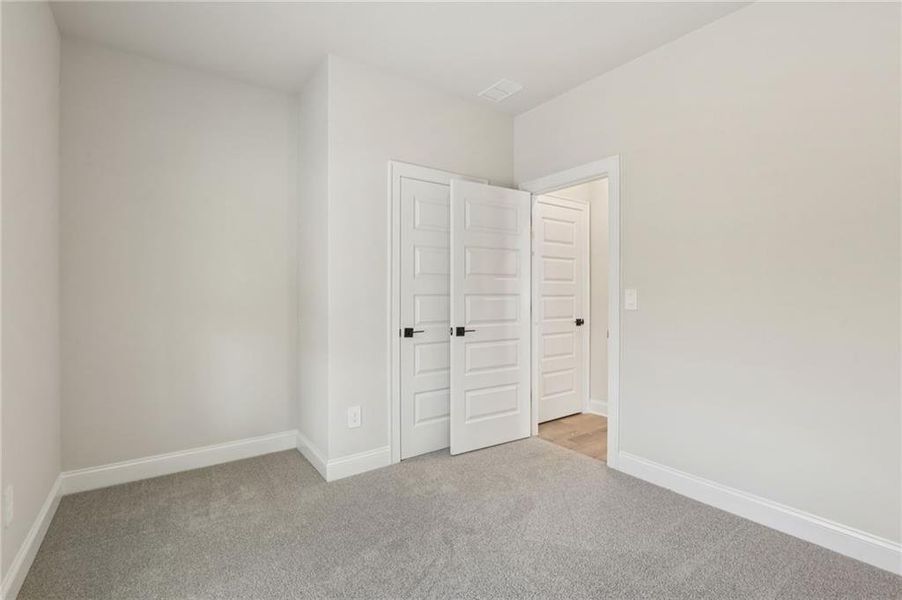 Spacious, unfurnished interior of a new home in Hemingway - Reserve Series, Cumming (Image 38).