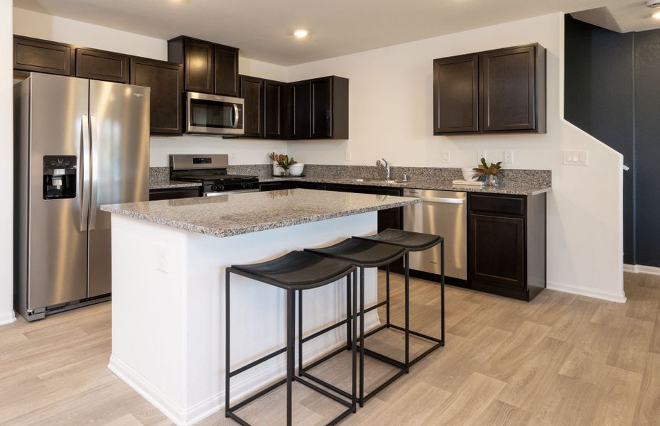 Representative furnished interior of a home built from the Kaufman by Pulte Homes in Strata, Dacono (Image 15).