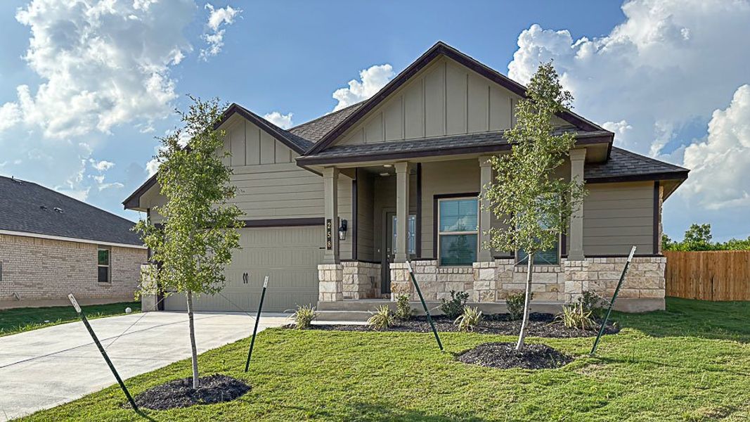 Front exterior of a new home in Creekfall, Burnet, TX, highlighting curb appeal (Image 19). Front exterior of a new home in Creekfall, Burnet, TX, highlighting curb appeal (Image 19).