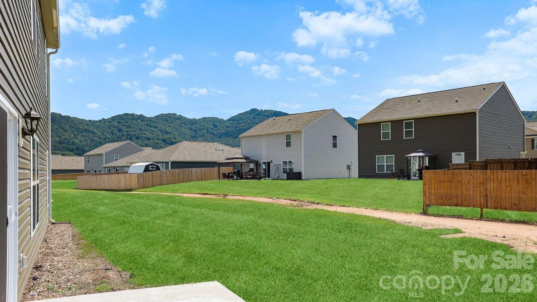 Exterior details and patio area of a home in Wildbrook Village, Waynesville (Image 4). Exterior details and patio area of a home in Wildbrook Village, Waynesville (Image 4).