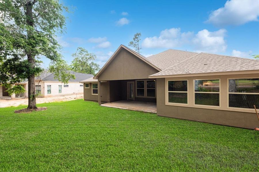 Scenic backyard. Make it your own by adding a fence and even a pool!