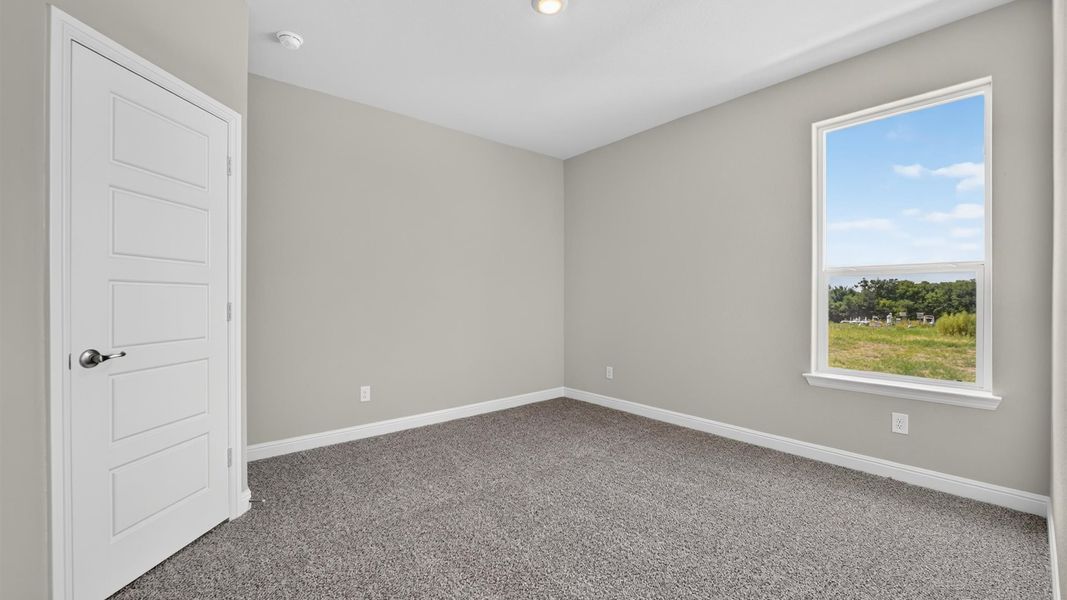 Representative unfurnished interior of a home built from the Tallow by D.R. Horton in Treeline, Justin (Image 28).