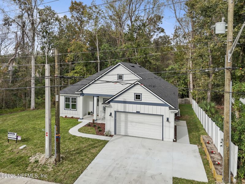 Front exterior of a new home in , Jacksonville, FL, highlighting curb appeal (Image 33).