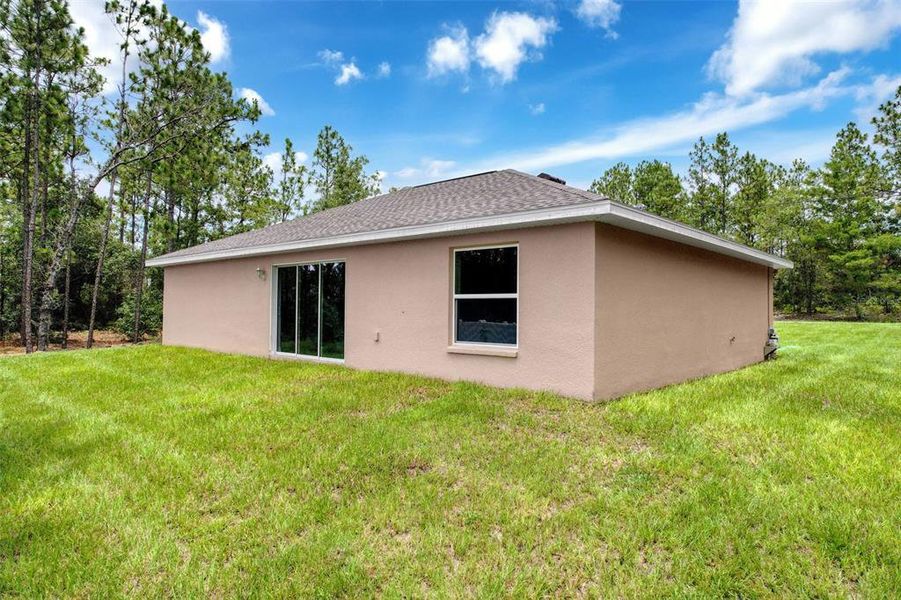 Front exterior of a new home in , Dunnellon, FL, highlighting curb appeal (Image 26).