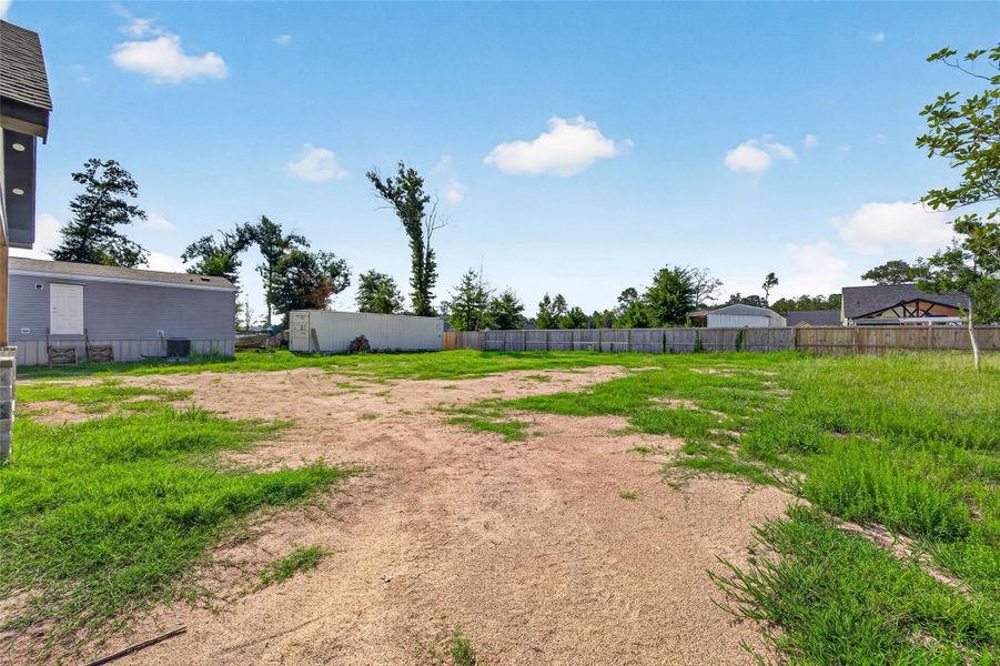 Expansive 14,000 SF backyard offering an exceptional amount of outdoor space for entertaining, recreation, pets, gardening, a future pool, or creating your own private outdoor oasis.