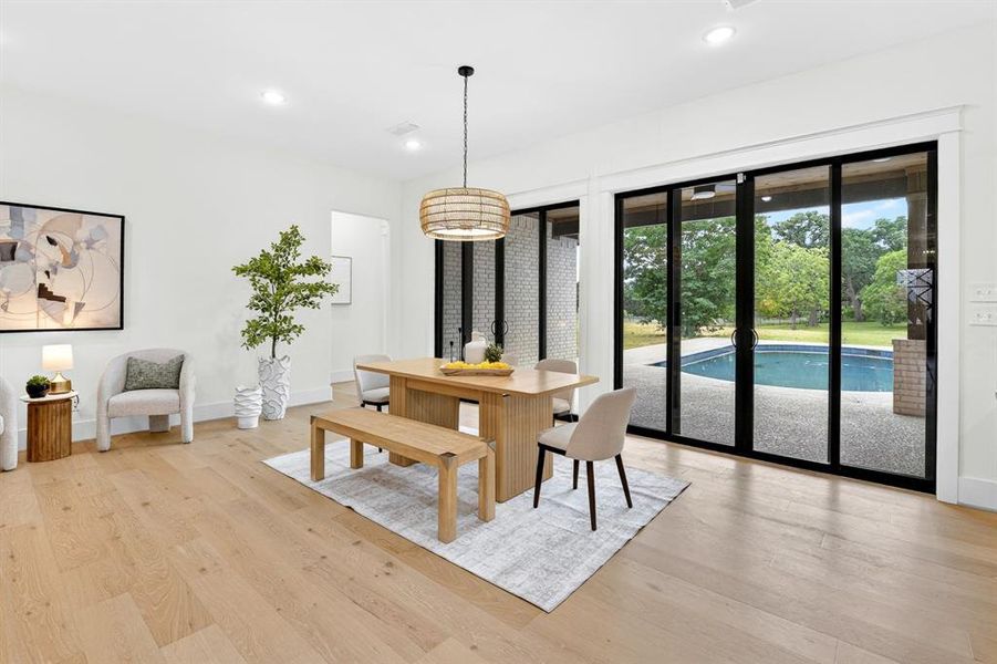 Separate dining space located off the large slider doors with spectacular views to the amazing property Separate dining space located off the large slider doors with spectacular views to the amazing property