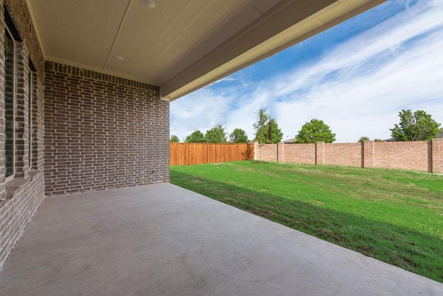 Exterior details and patio area of a home in Villages of Creekwood, Frisco (Image 3).