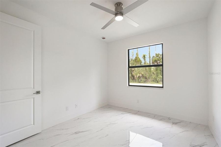 Spacious, unfurnished interior of a new home in , Port Charlotte (Image 17).