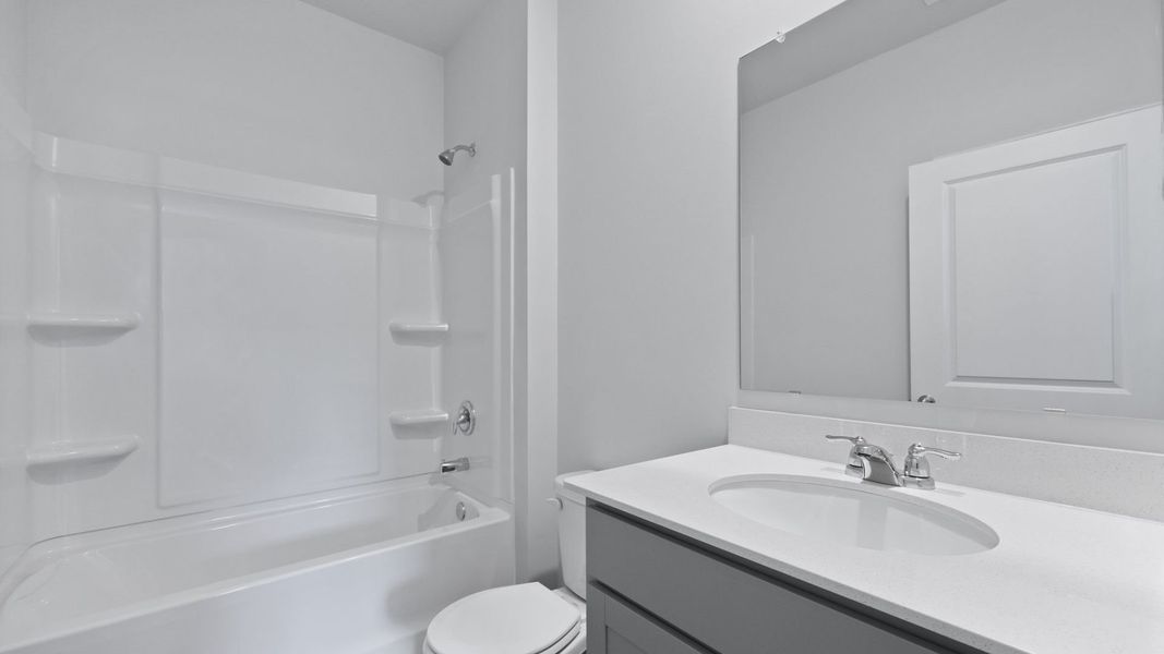 Representative furnished interior of a home built from the PERRY by D.R. Horton in North Shore, Summerton (Image 12).