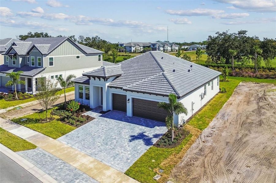 Exterior details and patio area of a home in Hawkstone, Sarasota (Image 3).