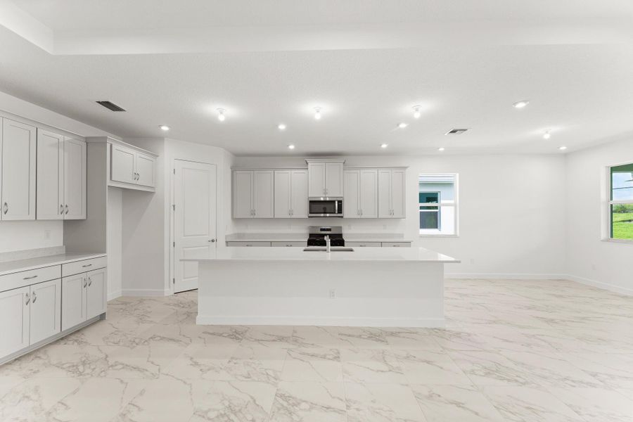 Furnished interior view inside a new home in Tradition - Telaro, Port St. Lucie (Image 5).