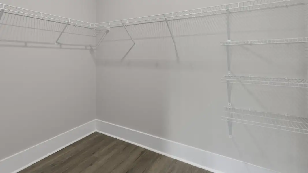 Spacious, unfurnished interior of a new home in The Retreat at Indigo Preserve Townhomes, Leland (Image 20).