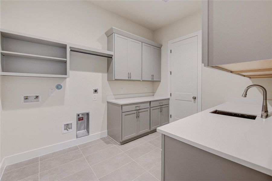 The laundry room is connected to the primary closet The laundry room is connected to the primary closet