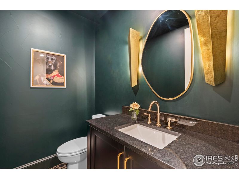 Powder baths throughout feature soapstone, quartz, under cabinet/custom lighting, and wallpaper