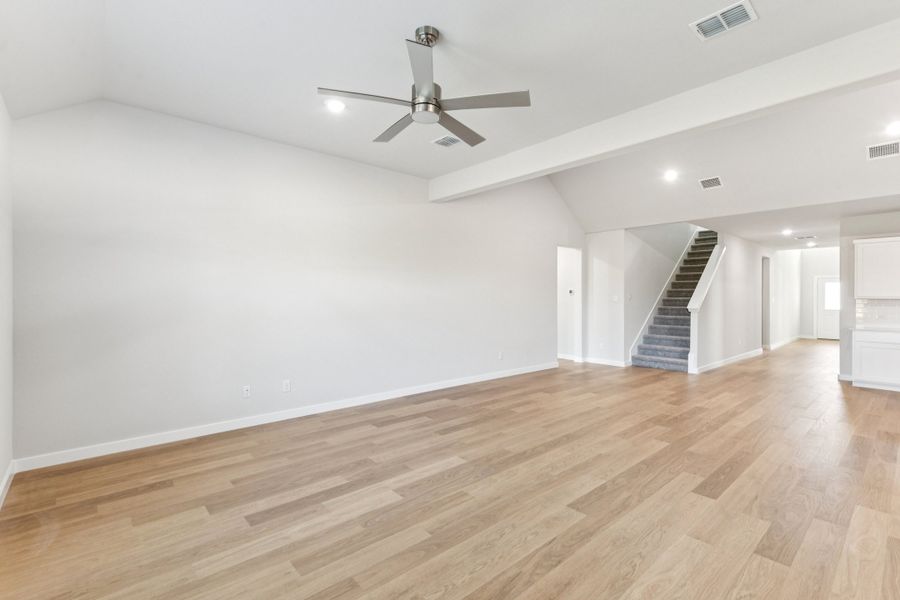 Open First Floor in the Wimbledon home plan by Trophy Signature Homes – REPRESENTATIVE PHOTO Open First Floor in the Wimbledon home plan by Trophy Signature Homes – REPRESENTATIVE PHOTO