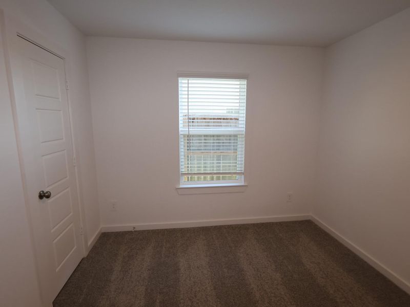 Spacious, unfurnished interior of a new home in Pinewood at Grand Texas, New Caney (Image 2).